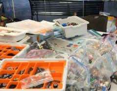 A maker table filled with supplies at the Constructing Modern Language conference in July 2014.